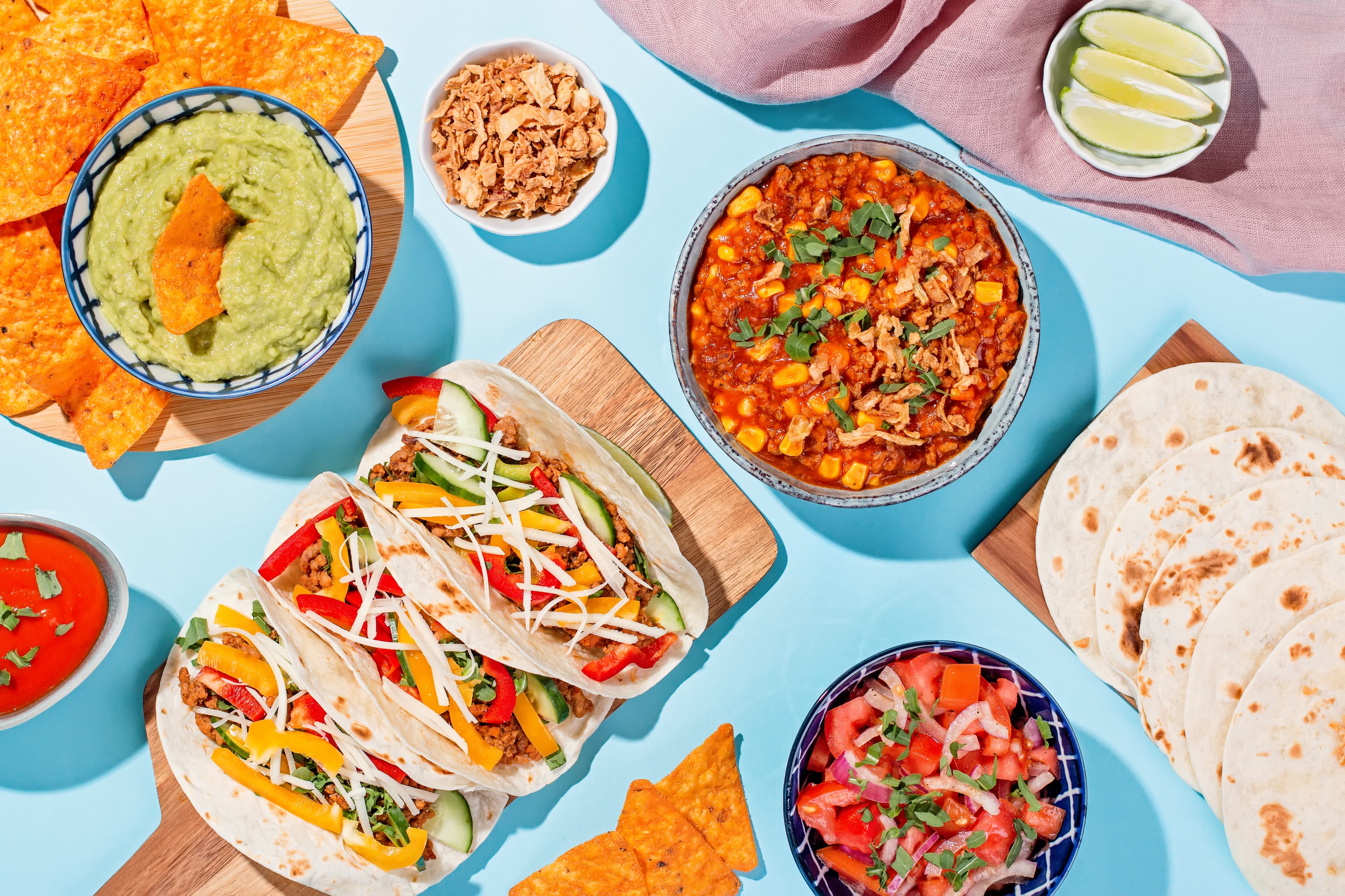 Beautifully presented Mexican catering spread with colorful dishes